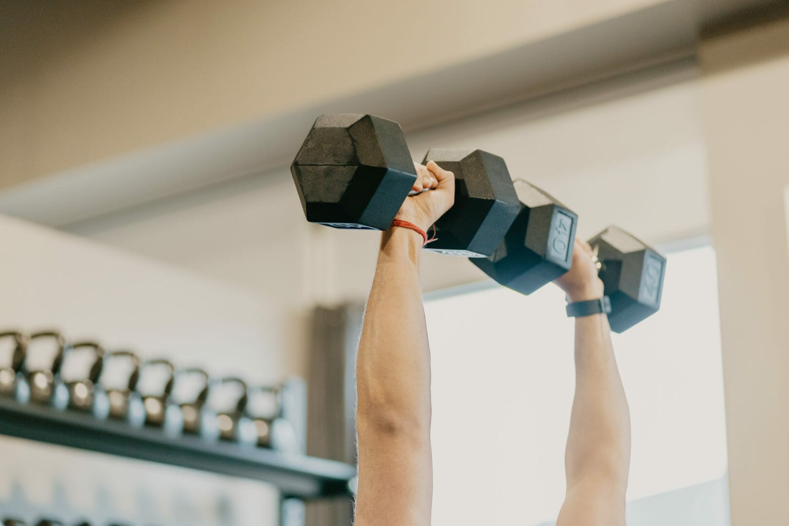 man training with weights