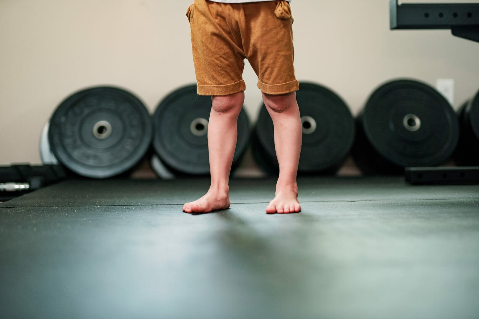 kid building healthy habits at the gym